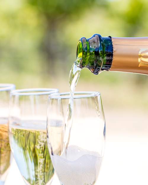 Domaine Carneros sparkling wine pour