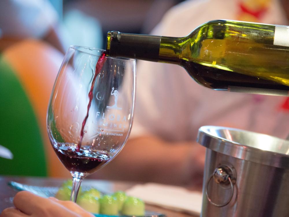 Pouring Cabernet Sauvignon wine in a glass